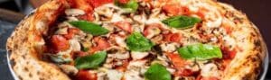 Pizzas-que-enamoran-Pizzerias-imperdibles-en-Santo-Domingo-300x89 Blog